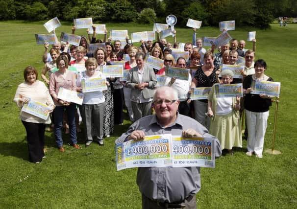 FREE USE
31.5.14
Kilsyth
Peoples Postcode Lottery winners at the Colzium Estate in Kilsyth.
Hugh and Isobel Lundy are pictured following Hugh' £800,000 win with 2 lottery tickets

Pictures Copyright: Iain McLean
79 Earlspark Avenue
G43 2HE
07901 604 365
www.iainmclean.com
photomclean@googlemail.com
07901 604 365
ALL RIGHTS RESERVED
