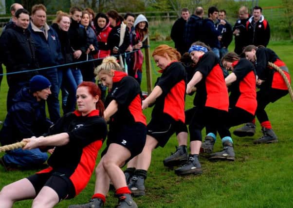 Pulling their weight...Women from Biggar YFC at the Lanarkshire YFC Tug of War contest 2014 at Biggar Rugby Club (Pic Rodger Price)
