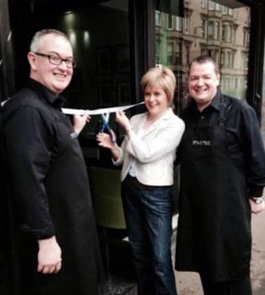 Nicola Sturgeon cuts the ribbon to open Bell and Felix.