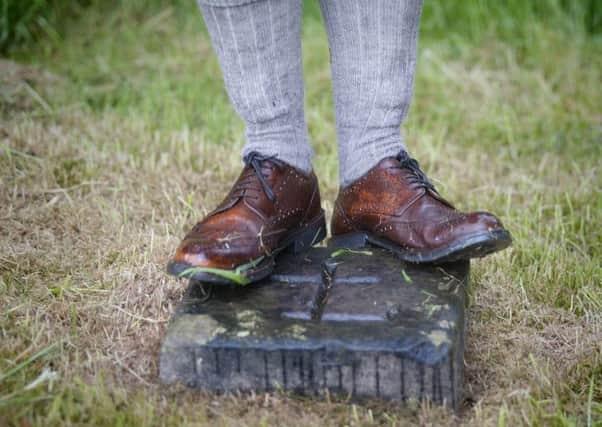 Sock it to 'em...Cornet guards a boundary stone on the Perambulation of the Lanark March Stones on Monday, June 9, 2014 (Pic Roberto Cavieres)