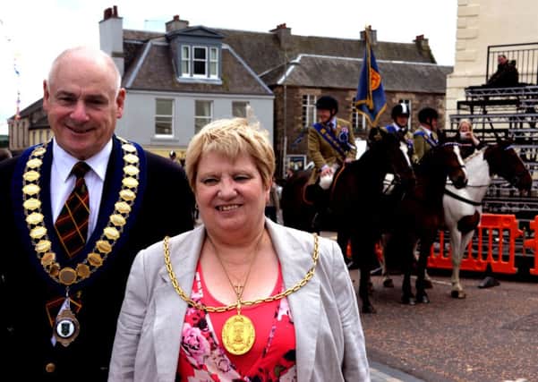 Safe Oot...Lanimer chairman Millar Stoddart and Provost Eileen Logan at the official Lanimer Ride Out send off from Lanark Cross on Tuesday, June 10, 2014  (Pics Rodger Price)