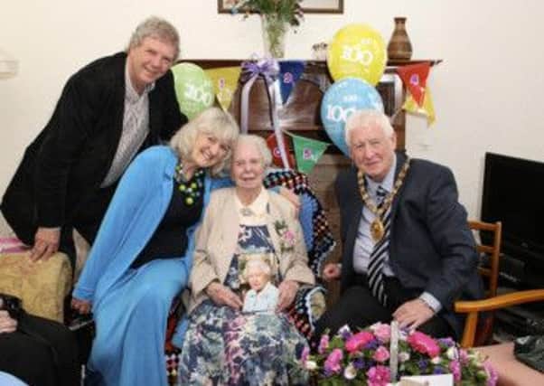Margaret Mills celebrates her big day with son Ian, daughter-in-law Margaret and North Lanarkshire provost Jim Robertson