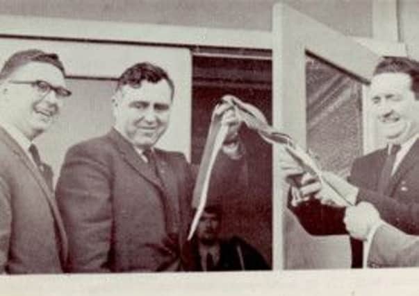 OPENING: Jim (extreme left) is pictured with Provost Gordon Murray as Celtic manager Jock Stein cuts the ribbon to officially declare Cumbernauld Uniteds new pavilion at Ravenswood open.