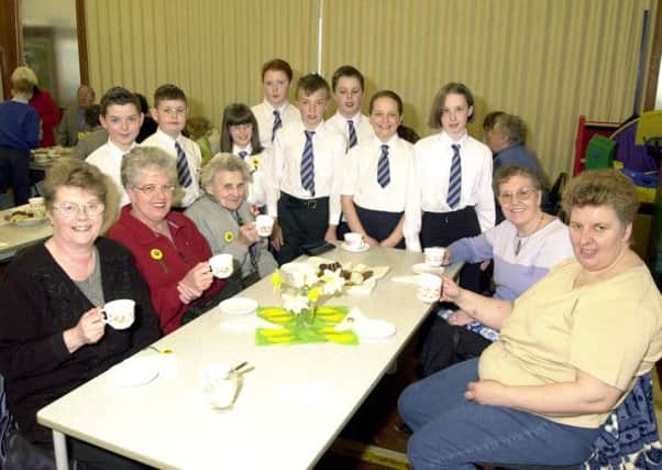 TEA TIME: Enjoying a cuppa at a daffodil tea for senior citizens held in Chapelgreen Primary School, Queenzieburn in 2002. (Picture by Alan Murray, ref. 4272)