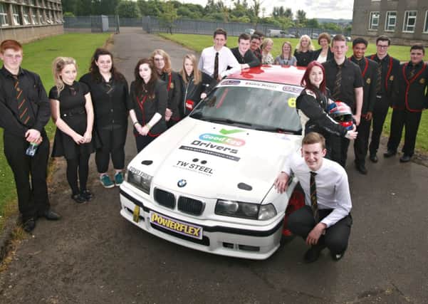 GOOD EGG YOUNG DRIVER SAFETY CAMPAIGN WITH SCOTTISH SUN RACER CHRISTIE DORAN AT KILSYTH ACADEMY, GLASGOW. PIC SHOW THE YOUNG DRIVERS WITH CHRISTIE AND HER BMW COMPACT CUP RACE CAR. FOR FULL DETAILS CONTACT JAN JAMES 07980 851360/jan@dynamicadgroup.com