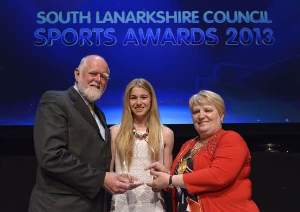 Winner...Carluke athlete Pamela McNicol receives her award from Provost Eileen Logan and Councillor Hamish Stewart (

Submitted pic)