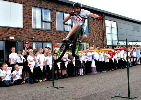 Bespoke show...One of the stunt riders at Carluke's Crawforddyke Primary School on Monday, May 19, 2014. (Pic by Rodger Price)