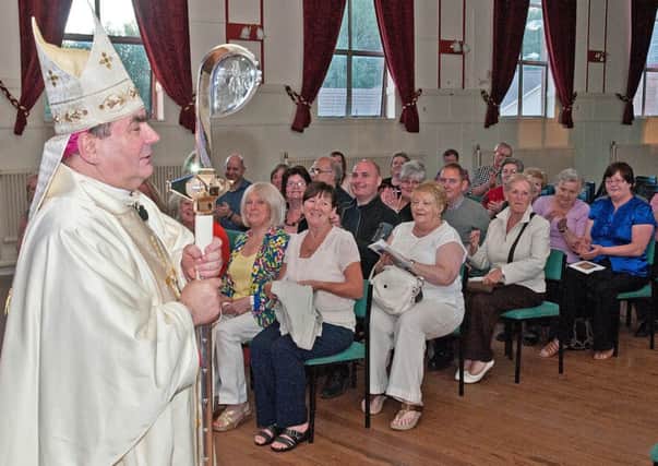 The installation of Joseph Toal, Bishop of Motherwell. Following the Mass of Installation the New Bishop joins some of the congregation who watched the ceremony in the upper St.Bride's Hall.