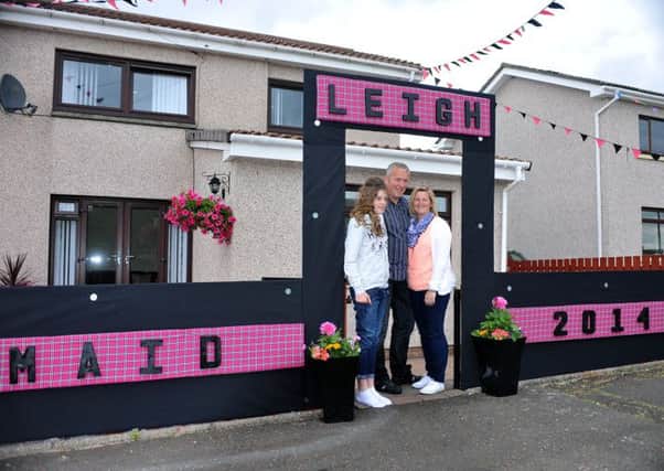 Maid up...Ann and Paul Bradford put up this amazing Highland Games garden in front of their house in honour of daughter Leigh, who was a maid at Forth Gala Day on June 21, 2014 (Pics by Roberto Cavieres)