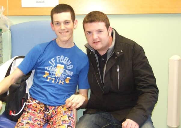 Celebrity visitor... Harry Prentice iin hospital with visitor, comedy star Kevin Bridges (Submitted picture)