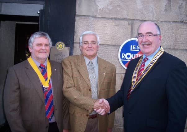 Congrats...Neil (right), with Bill (centre) and vice president Joe Hunter
