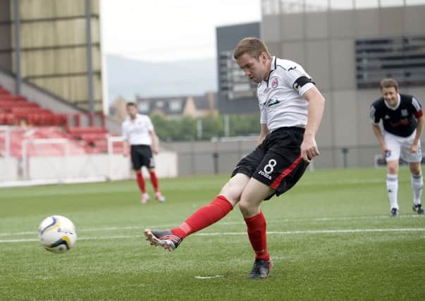 John Sweeney fires home from the penalty spot to score Clyde's second against Ayr United on Saturday.