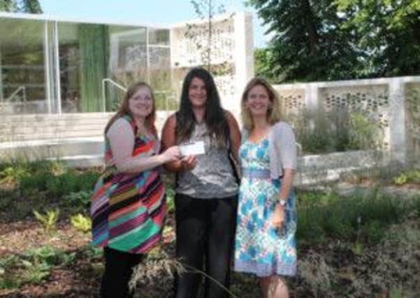 Cheque mate...Elizabeth Emmerson (centre)  with Lorrie  and  Marion Taylor
