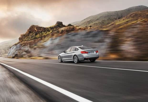 2014 BMW 4 Series Gran Coupe. The 4 Series Gran Coupe is packed with personality and style. See PA Feature MOTORING Road Test. Picture credit should read: PA Photo/Handout. WARNING: This picture must only be used to accompany PA Feature MOTORING Road Test.
