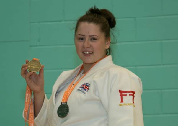 Golden girl...Michelle Boyle with her Sainsburys Childrens Games gold medal		(Pic by Dave Taylor)