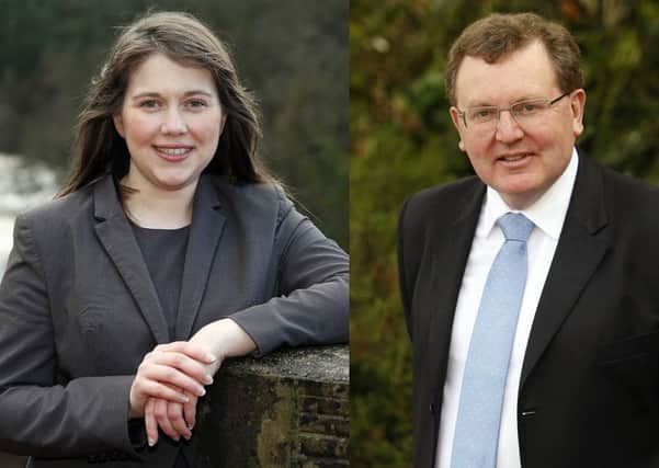 Financial concern...Scotland's share of the national debt is debated by Aileen Campbell and David Mundell