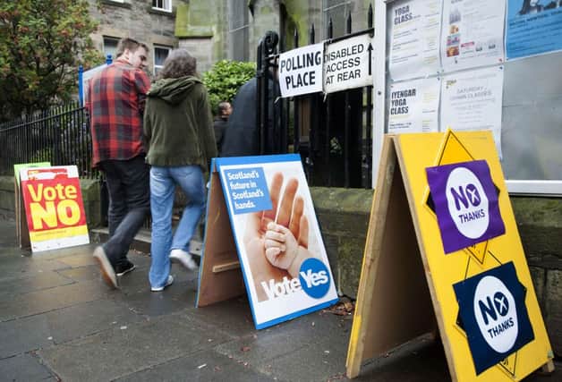 Pro-independence and pro-union literature surrounds a polling station in the south of Edinburgh, Scotland, on September 18, 2014, during a referendum on Scottish independence. Scotland began voting Thursday on whether to become independent from Britain in a referendum which has electrified the nation, dominating debate in homes and pubs from Edinburgh to the Highlands.  AFP PHOTO / LESLEY MARTINLESLEY MARTIN/AFP/Getty Images