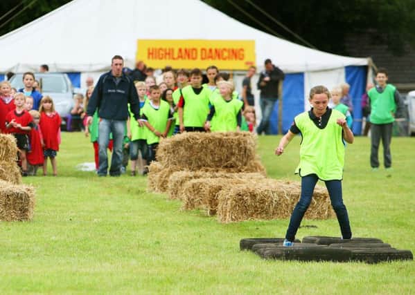 Far from tyred...children competed in the obstacle course at the 2014 Biggar Agricultural Show (Pics by James Clare)