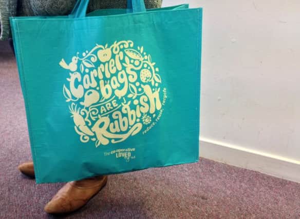 The Co-operative has also pledged its carrier bag profits to community causes