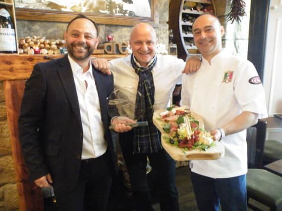 Above: Peoples choice winners Nunzio and Mariano Russo welcome Aldo Zilli to Volare. Below: Best chef winner Chris Rouse with wife Geri.