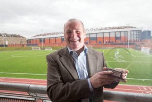 Gus Macpherson with his SFPL League Two Manager of the Month award.