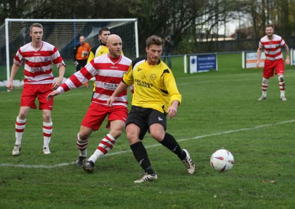 Tough tussle...Lesmahagow lost to Bellshill on Saturday (Pic by Johnny Weir)
