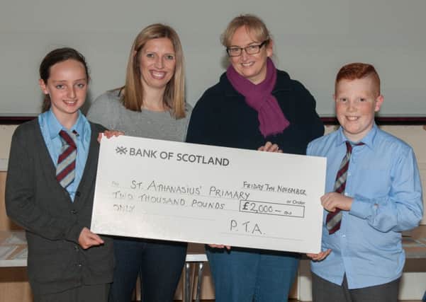 Cheque it out...at St Athanasius Primary (Pic by Sarah Peters)
