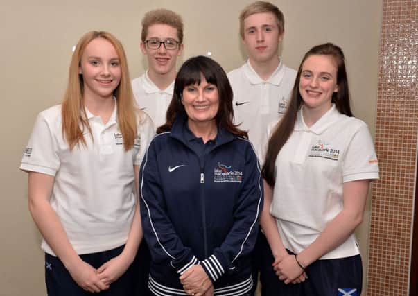 INTERNATIONAL: Coach Tricia Naido with North Lanarkshire's young elite swimmers Lucy McGhee, Chloe O'Hara, William Balfour and Thomas Balvour.