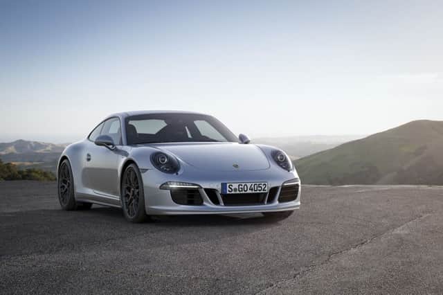 Photo of Autodesk VRED Professional 2014 SR1-SP7, Now a permanent part of the range, the 911 GTS sits between the Carrera S and GT3 models, Picture credit should read: PA Photo/Handout. WARNING: This picture must only be used to accompany PA Feature MOTORING Road Test.