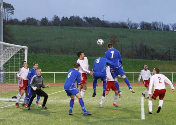 Heads up...for Carluke Rovers     (Pic by Kevin Ramage)