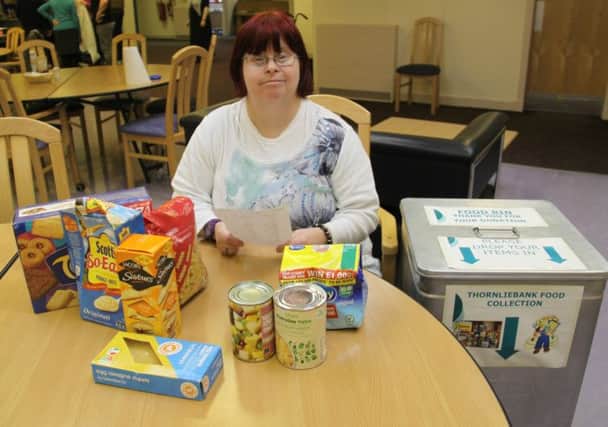 Thornliebank service user Karene McDougall, pictured last week collecting for the foodbank