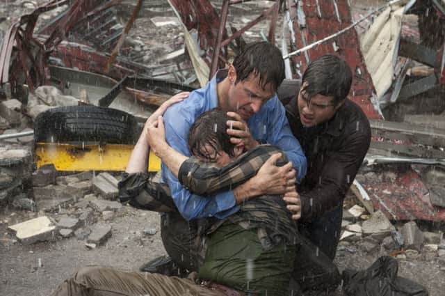 Undated Film Still Handout from Into The Storm. Pictured: Max Deacon as Donnie, Richard Armiage as Gary, and Nathan Kress as Trey. See PA Feature DVD DVD Reviews. Picture credit should read: PA Photo/Handout/Warner Home Video. WARNING: This picture must only be used to accompany PA Feature DVD DVD Reviews.