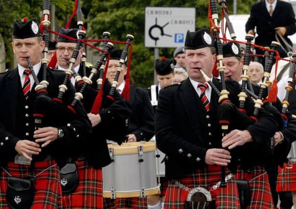 Cumbernauld Gala Day.
Kilsyth Thistle Pipe Band. Procession along North Carbrain Road.
Pic by Alan Murray 14-07-12