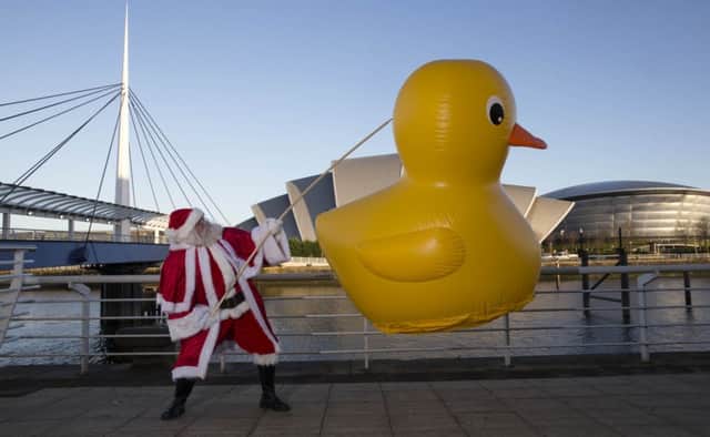 16/12/14...
SECC - GLASGOW
To celebrate the launch of the IRN-BRU Carnival at the SECC on 19 December, Santa got into the spirit of things by having a go at one of the best loved carnival games of all time hook a duck ! However this was no ordinary version as duck in question was over 6ft tall and 6ft wide, and the pool he hooked it from was the River Clyde