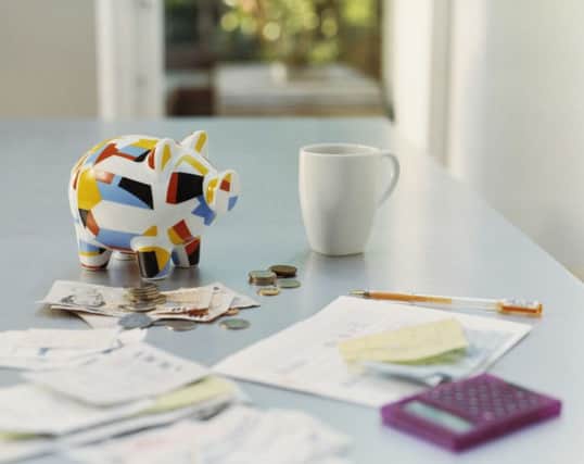 A Generic Photo of money on a table, See PA Feature FINANCE Finance Column,  Picture credit should read: PA Photo/thinkstockphotos. WARNING: This picture must only be used to accompany PA Feature FINANCE Column.