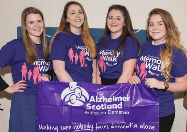 Walk team...Eilidh  (second from right) with sister Kirsty,  friend Nicole  and  Alzheimer Scotlands Laura Stockwell (Pic Sarah Peters)