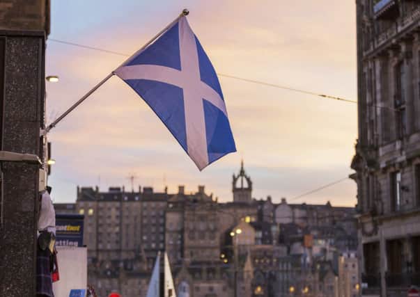 St Andrew's Day Celebrations, South St Andrew's Street, Edinburgh.

Pictured: A saltire flies above a souvenir shop with the spire of St Giles behind.

Image by: Malcolm McCurrach
Sun, 30, November, 2014. © Malcolm McCurrach 2014. All rights Reserved. picturedesk@nwimages.co.uk | www.nwimages.co.uk | 07743 719366

JP Resell