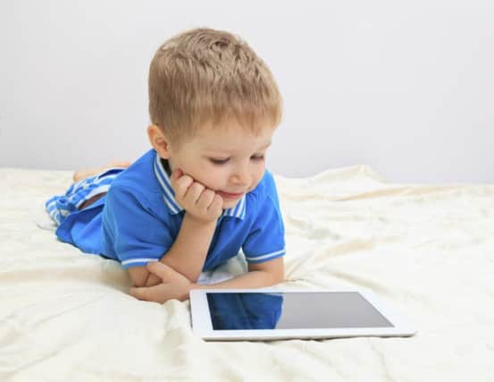 A Generic Photo of a child using a tablet. See PA Feature FAMILY Family Column. Picture credit should read: PA Photo/thinkstockphotos. WARNING: This picture must only be used to accompany PA Feature FAMILY Family Column.