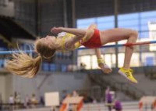 Over the top...Emily McNicol clears the bar in style to win a silver medal (submitted picture)