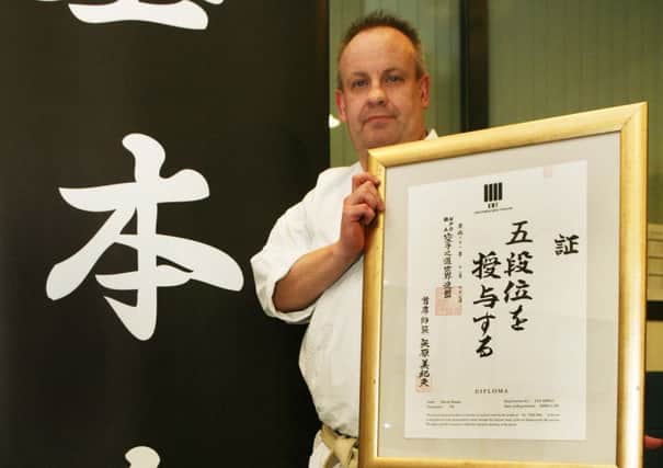 Karate 6th Dan Stevie Mason, achieved accolade during grading with Japanese masters in London (Pic by Jim Clare)