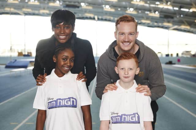 Greg Rutherford and Perri Shakes-Drayton who are encouraging kids to fulfil their potential and offering the chance to win a mentorship with them both as part of Disney Aim High. Picture credit should read: PA Photo/Adam Lawrence.