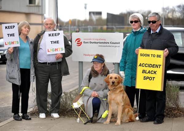24-03-2015 Picture Roberto Cavieres.  Kirkintilloch. Protest outside Council HQ over Catherine Street junction. Councillors arriving for meeting to decide on plans for junction. Sandy Taylor Visually Impaired Forum