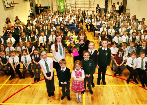 Surprise...Kirkton Primary School Head Teacher Moira Meiklejohn at the surprise assembly (Pic by Jim Clare)
