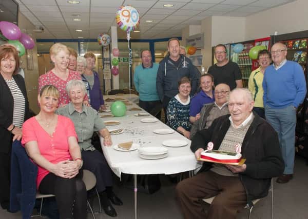 06/04/2015 Picture Sarah Peters.  Fred Higginson celebrating his 90th Birthday with fellow swimmers at Carluke Leisure Centre.