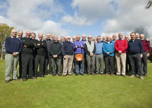 07-05-2015 Picture Sarah Peters. Carnwath Golf Club Members who purchased a defibralator for the Community after a fellow golfer passed away on the course.  Photo of all the Senior Members, Friends who played with Robert and 3 Members with Defib.  Left to right George hamilton, Alan Randall and Robin Hogg.