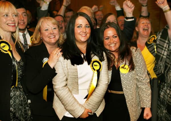 Ecstatic Angela...new MP celebrates with SNP supporters (Pic by Jim Clare)