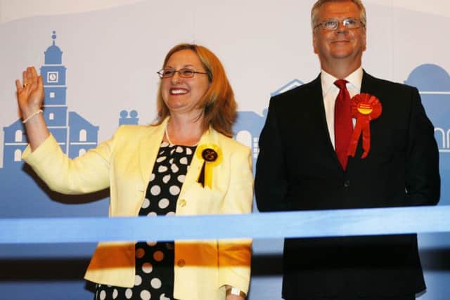 Call the doctor...Lisa Cameron acknowledges her win as Michael McCann looks on (Pic by Jim Clare)