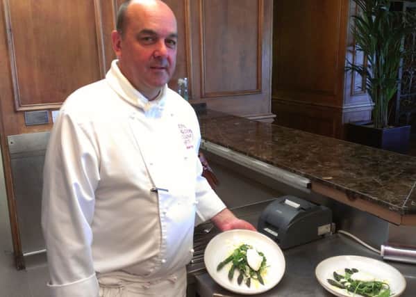 Chef Martin Hollis and his dish of grilled asparagus.
