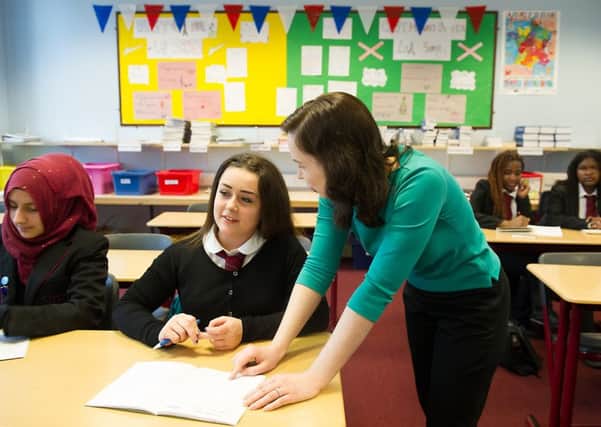 Including preparation and marking, teachers are working well over their 35-hour contracts. Picture: John Devlin