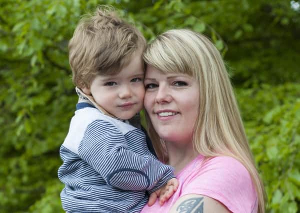 That's my boy...Andrea Watt from Carluke who is fundraising for Yorkhill, with her son Bryan (Pic by Sarah Peters)